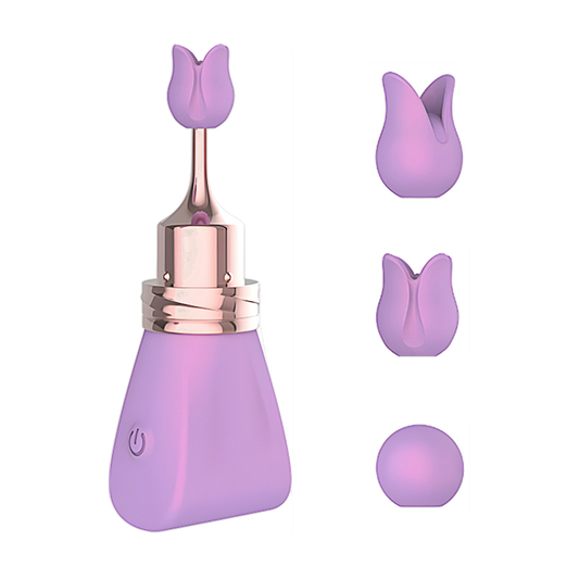 Purple bullet vibrator with three replaceable nozzles on the side on a white background